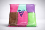 Bundle row of multi-color Vorre basic 320 GSM microfiber cleaning cloths on a counter.