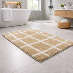 Beige checkered grid pattern recycled cotton bathmat by Vorre in a modern bathroom setting.