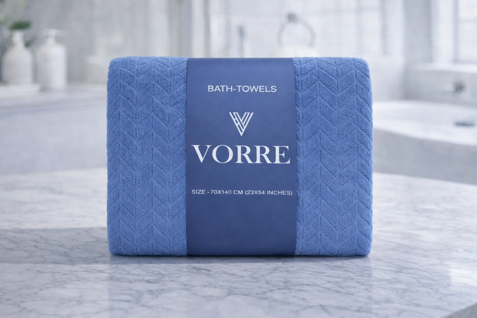 Packaged royal blue Vorre Blush microfiber bath towel wrapped securely with a premium branded label sleeve.