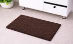 Dark brown chocolate ultra-plush loft micro polyester bathmat on a tiled bathroom floor.