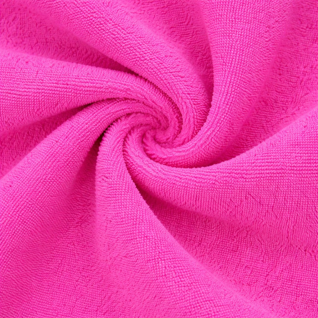 Vibrant magenta pink Vorre microfiber cleaning cloth, lint-free surface polishing towel.