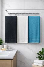 Vorre Micro Border white bath towel product infographic showcasing its premium fabric quality, everyday comfort, and high absorbency.