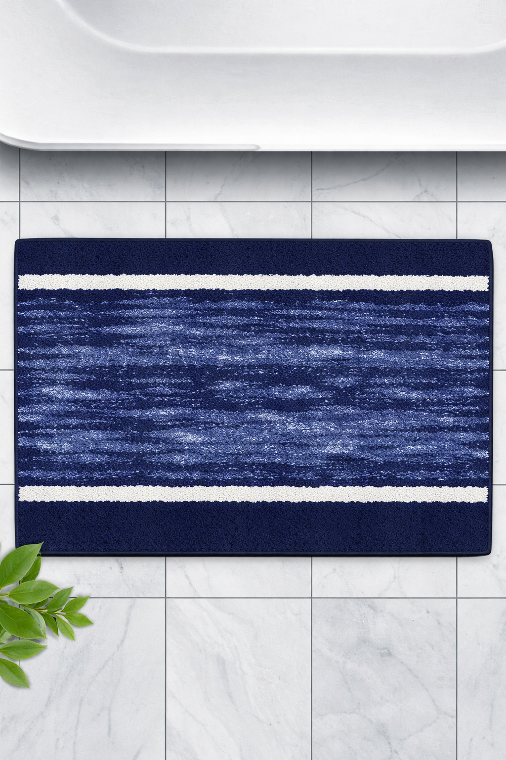 Navy blue ribbed ridge pattern micro polyester bathmat with protective rubber backing.