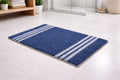 Navy blue Vorre recycled cotton bathmat with white stripes, highly absorbent 1400 GSM bathroom rug set.