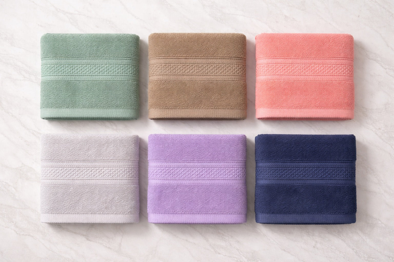 Six folded color choices of Vorre Norvelle premium 400 GSM eco-friendly hand towel bundles.