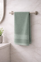 Sage green Vorre Norvelle 400 GSM recycled cotton hand towel, sustainable home bathroom linen.