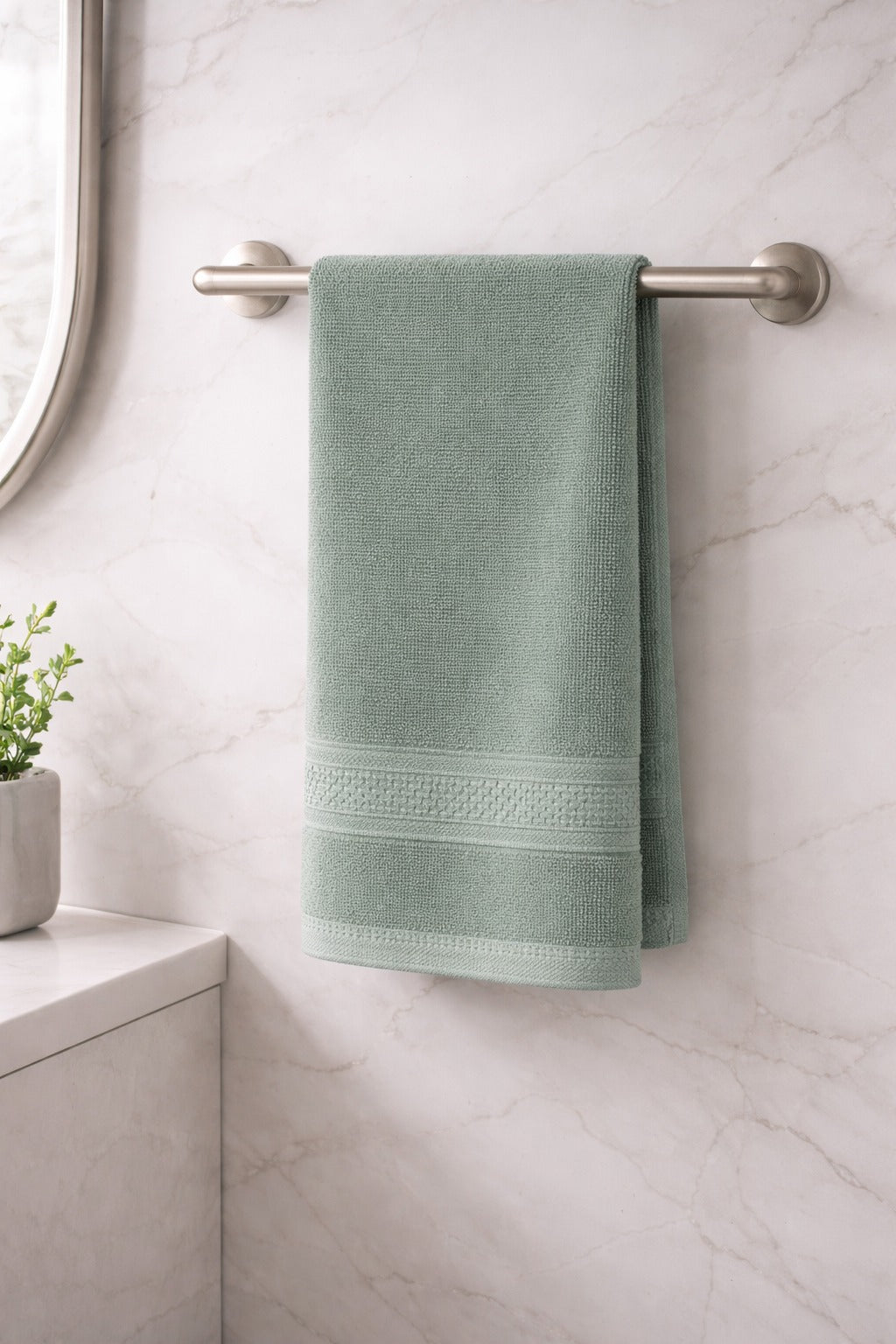 Sage green Vorre Norvelle 400 GSM recycled cotton hand towel, sustainable home bathroom linen.