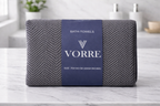 Packaged charcoal grey printed geometric Vorre microfiber bath towel featuring a premium branded packaging band.