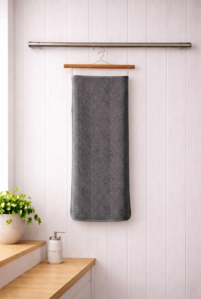 Charcoal grey geometric patterned Vorre microfiber bath towel, durable machine washable 280 GSM utility towel.