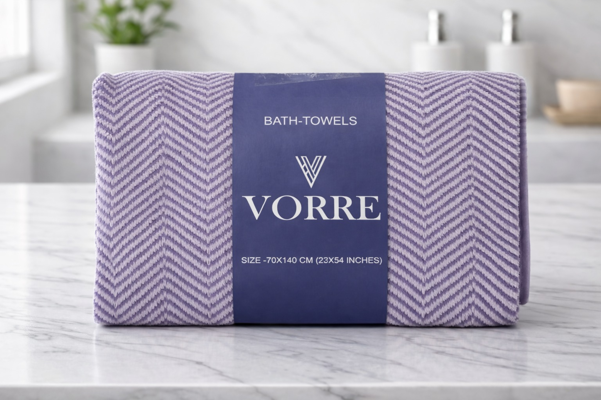 Packaged lavender purple textured Vorre microfiber bath towel neatly folded and wrapped with a signature dark blue brand band.