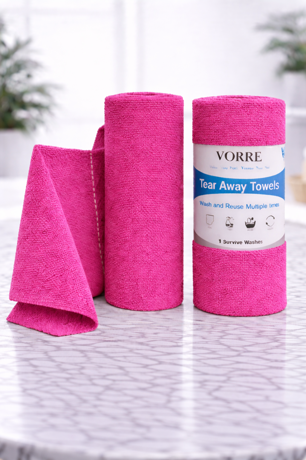 Raspberry pink Vorre tear-away microfiber towel roll, streak-free reusable cleaning cloths.
