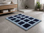 Slate blue Milan geometric block pattern micro polyester bathmat, plush 1800 GSM shower rug.
