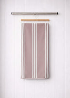 Dusty rose pink and white striped Vorre microfiber bath towel, plush quick-drying personal care towel.