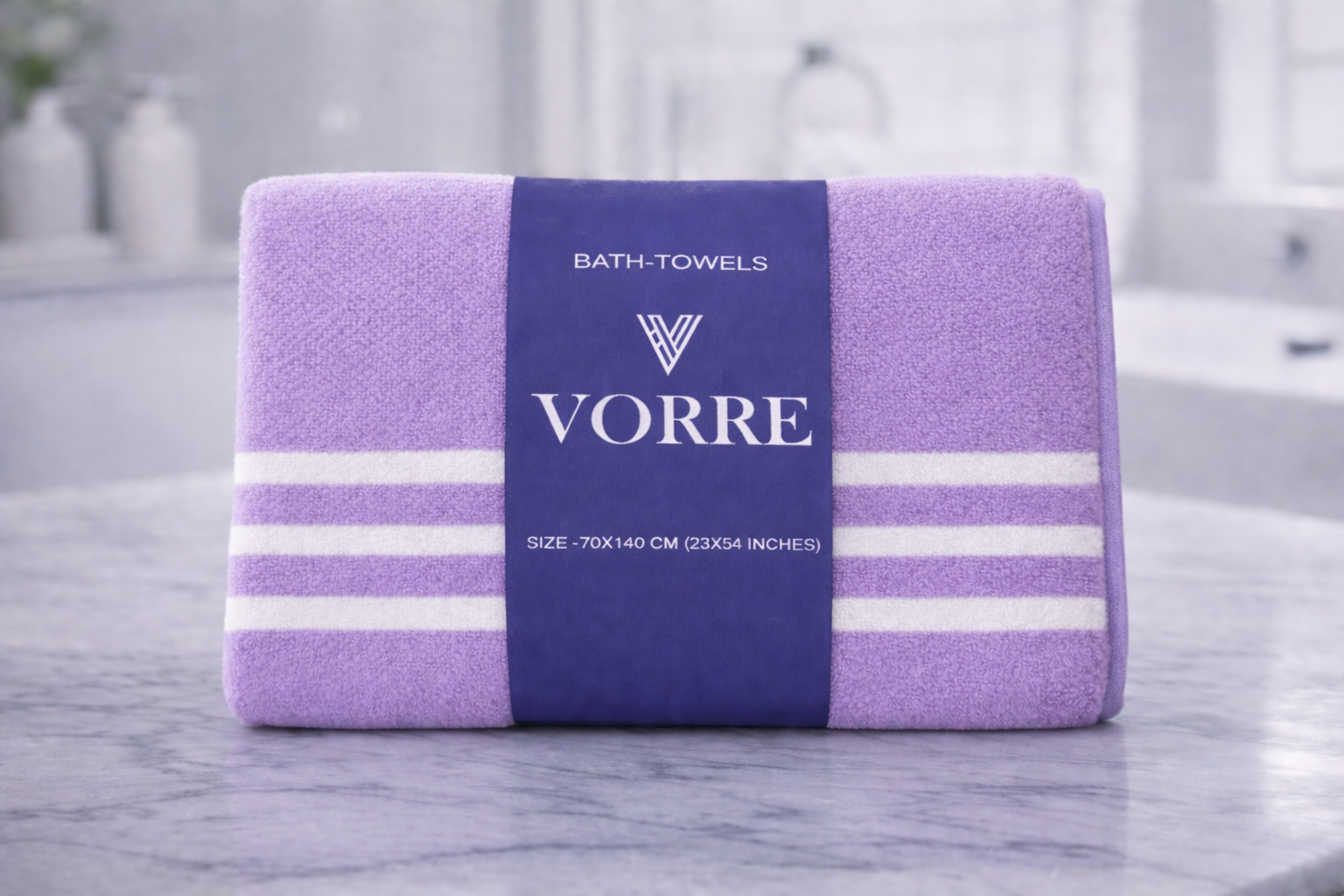 Packaged purple striped Vorre microfiber bath towel, neatly folded with a premium navy product wrapper.