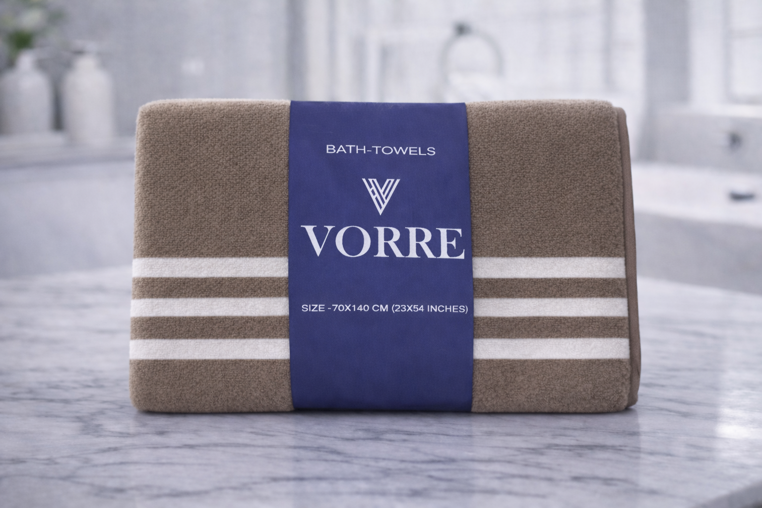 Packaged taupe brown striped Vorre microfiber bath towel wrapped securely in a branded belly band.