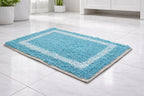 Teal aqua blue cotton mix bathmat with a solid white border frame, set of 2.