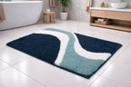 Teal aqua Skylark wave pattern micro polyester bath mat with non-slip backing, 45x75 cm.