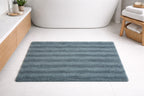Teal blue solid stripe microfiber bath rug, thick absorbent floor mat for modern bathrooms.