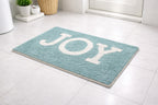 Teal aqua blue Joy text recycled cotton bathmat, plush 40x60 cm statement bathroom floor mat.